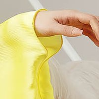 Dress yellow asymmetrical loose fit from satin fabric texture