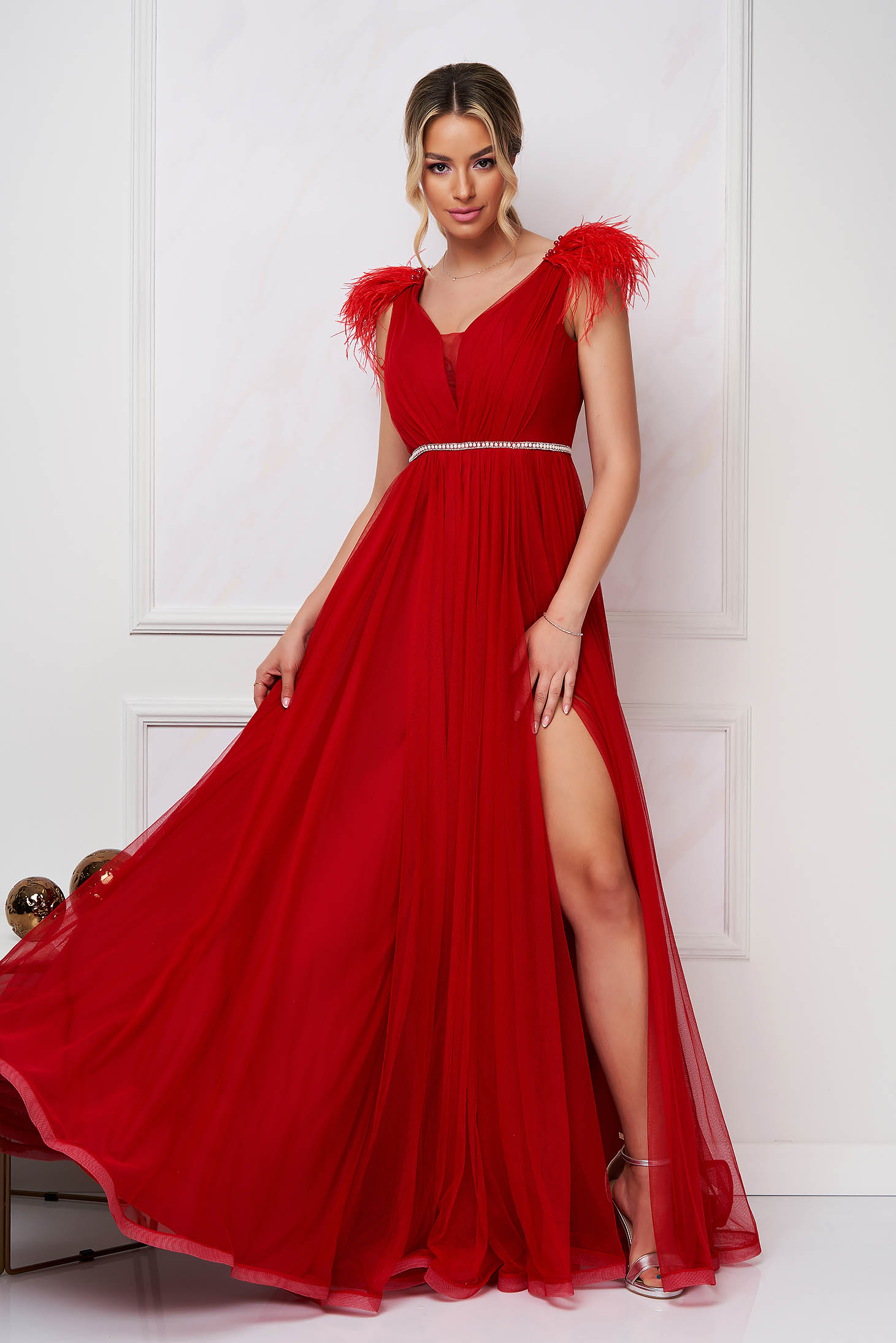 Long cloche from tulle with embellished accessories feather details red dress