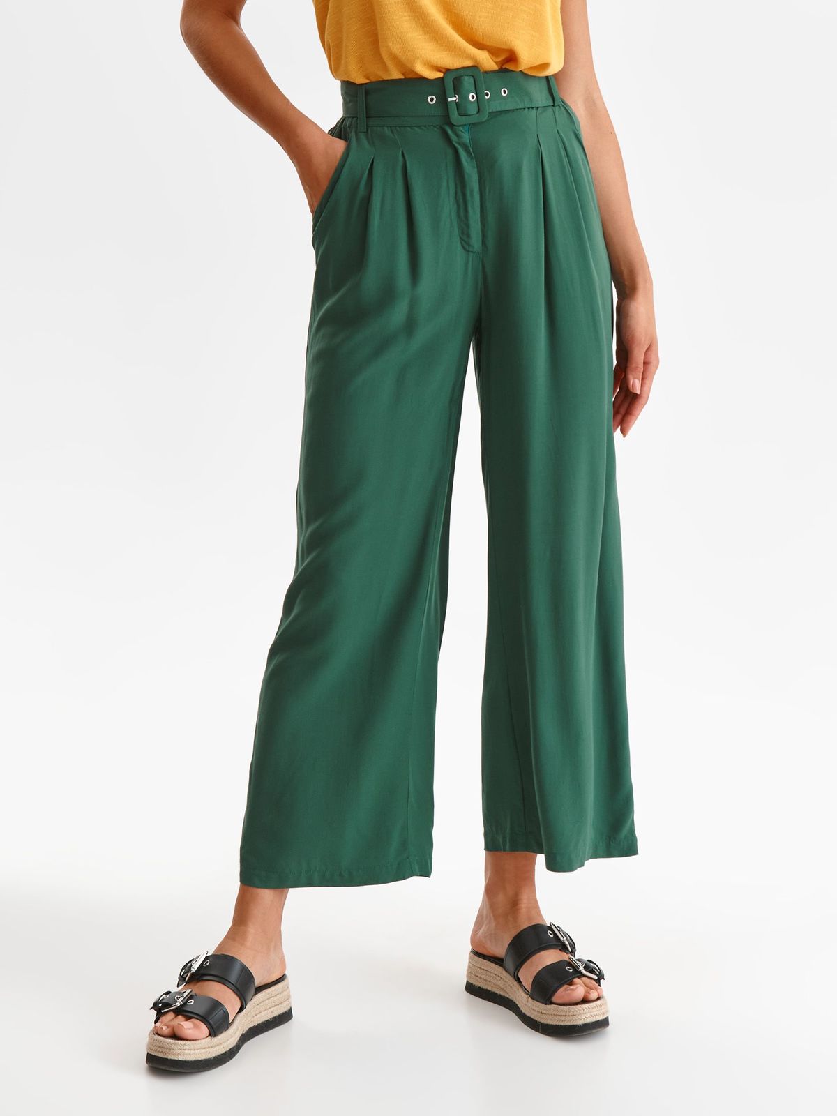 Green trousers thin fabric flared high waisted accessorized with belt