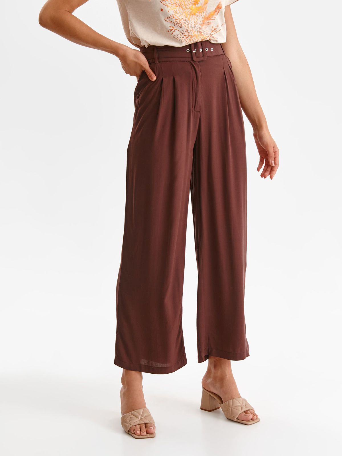 Brown trousers thin fabric flared high waisted accessorized with belt