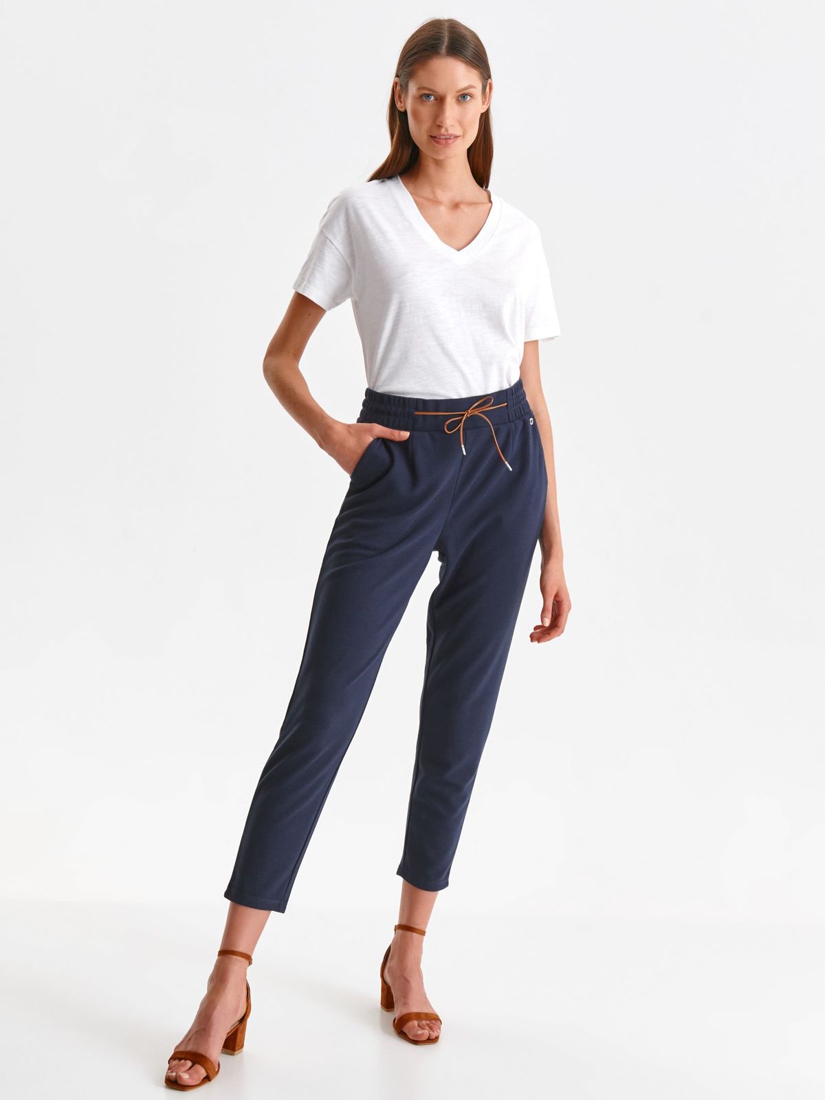 Dark blue trousers conical with pockets