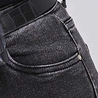 Black jeans skinny jeans with pockets accessorized with belt