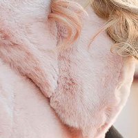 Lightpink gilet from ecological fur with pockets with undetachable hood