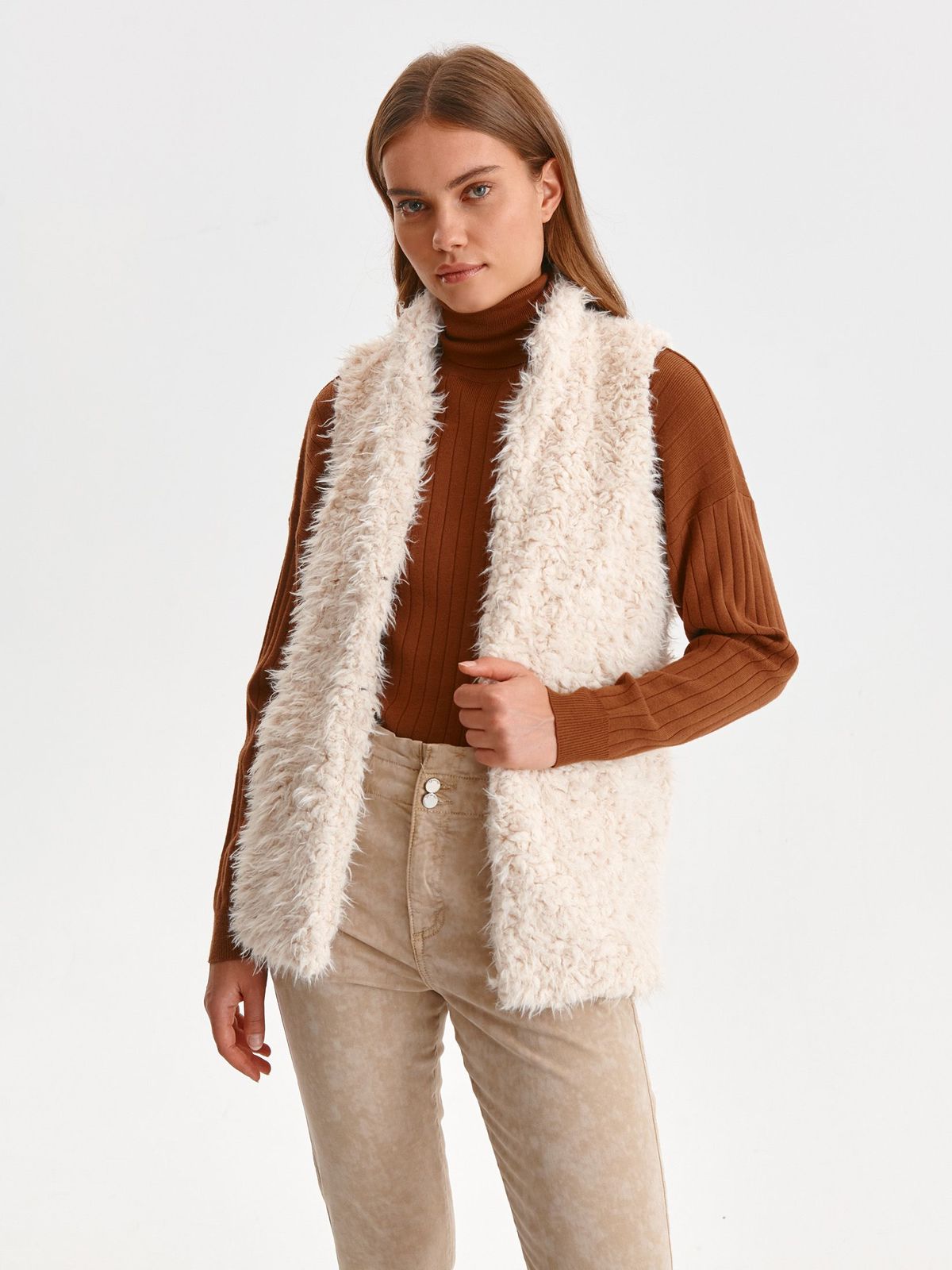 White gilet from fluffy fabric