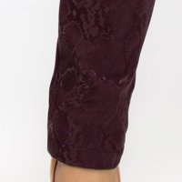Maroon faux leather tapered trousers with regular waist and front pockets - PrettyGirl