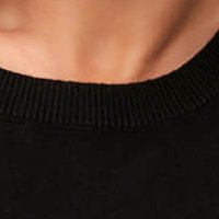 Black sweater knitted tented from soft fabric with ruffle details