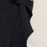 Black skirt slightly elastic fabric pencil pleats of material with ruffle details
