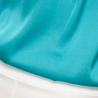 Turquoise women`s blouse from satin loose fit with cuffs with decorative buttons - StarShinerS