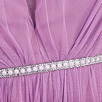 Long lilac tulle dress in flared style accessorized with rhinestones and feathers