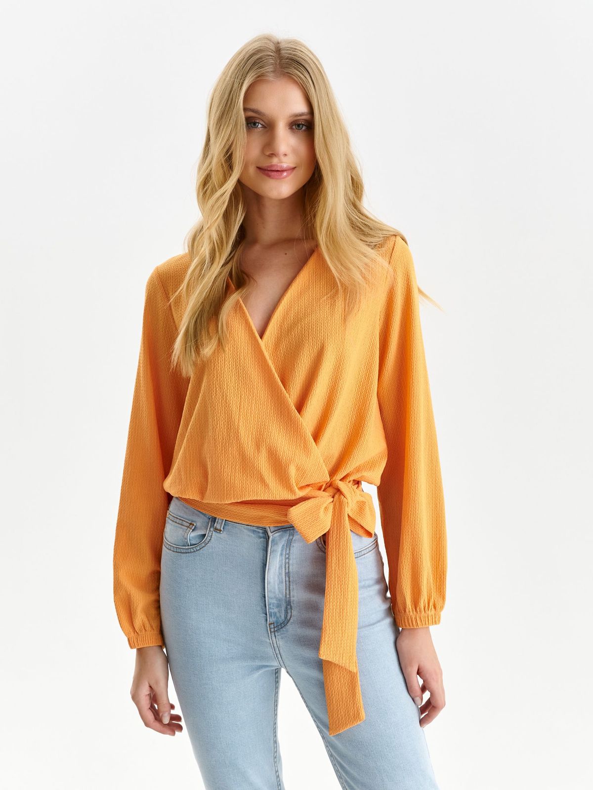 Orange women`s blouse loose fit from striped fabric wrap around