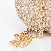 Aranyszínű táska csillogó díszítésekkel