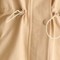 Beige jacket from slicker loose fit with laced details asymmetrical