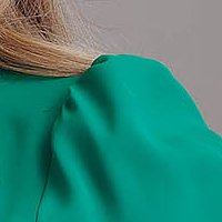 Green women`s blouse from veil fabric loose fit slightly elastic fabric with ruffle details