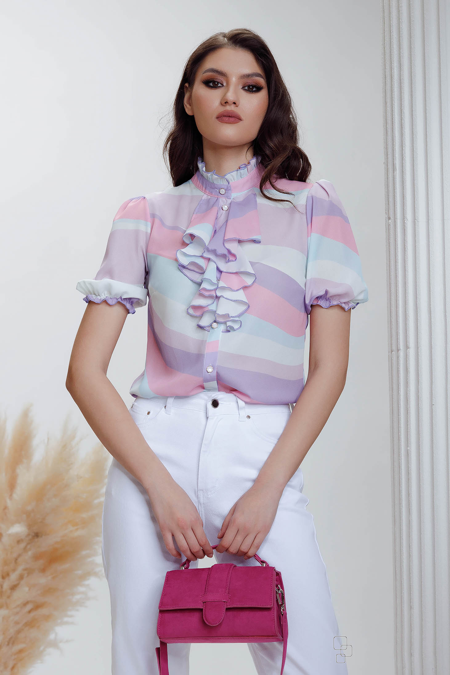 Women`s blouse from satin abstract with ruffle details