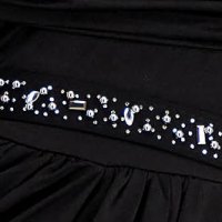 Black dress lycra long wrap around high shoulders accessorized with belt with crystal embellished details