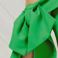 Green pencil dress made of thin material accessorized with bows - PrettyGirl