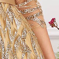Gold dress from tulle cloche long with glitter details with crystal embellished details accessorized with tied waistband