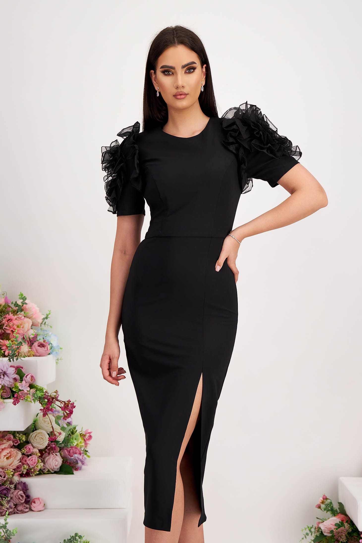 Black elastic fabric pencil dress with embossed flowers on the sleeves
