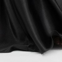 Fekete muszlin hosszú harang ruha válban tollas díszítéssel