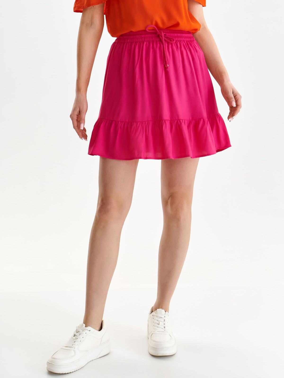 Pink skirt short cut cloche with elastic waist light material is fastened around the waist with a ribbon