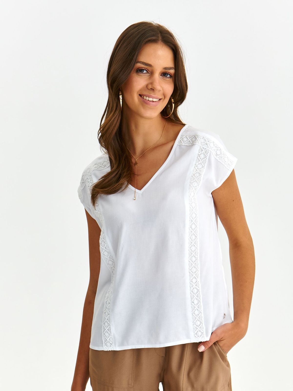White women`s blouse light material loose fit with lace details
