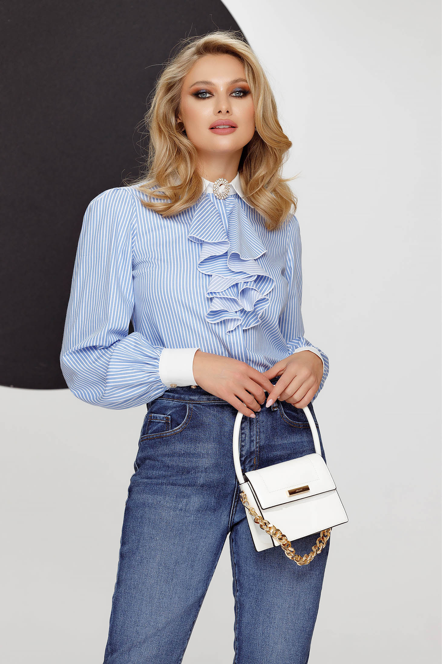 Women`s shirt long sleeve cotton with stripes with ruffle details accessorized with breastpin