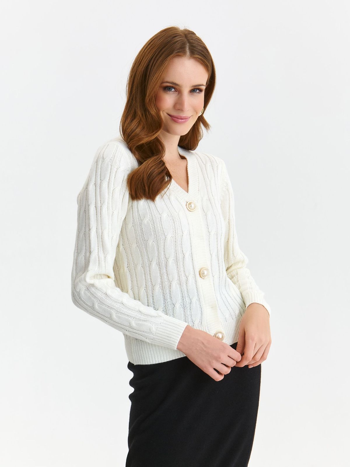 White cardigan knitted with v-neckline with decorative buttons