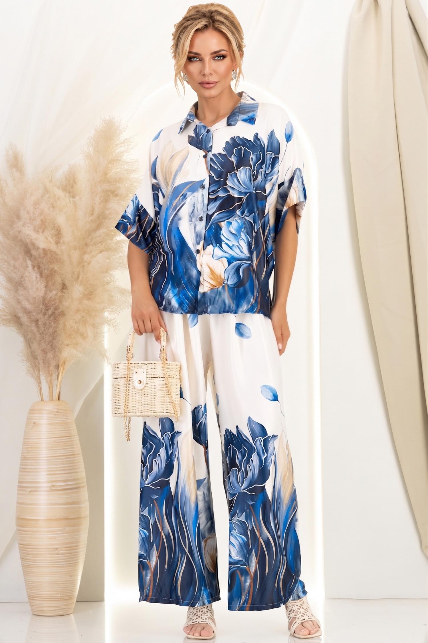 Compleu din material fluid albastru cu un croi larg si imprimeu floral 1 - StarShinerS.ro