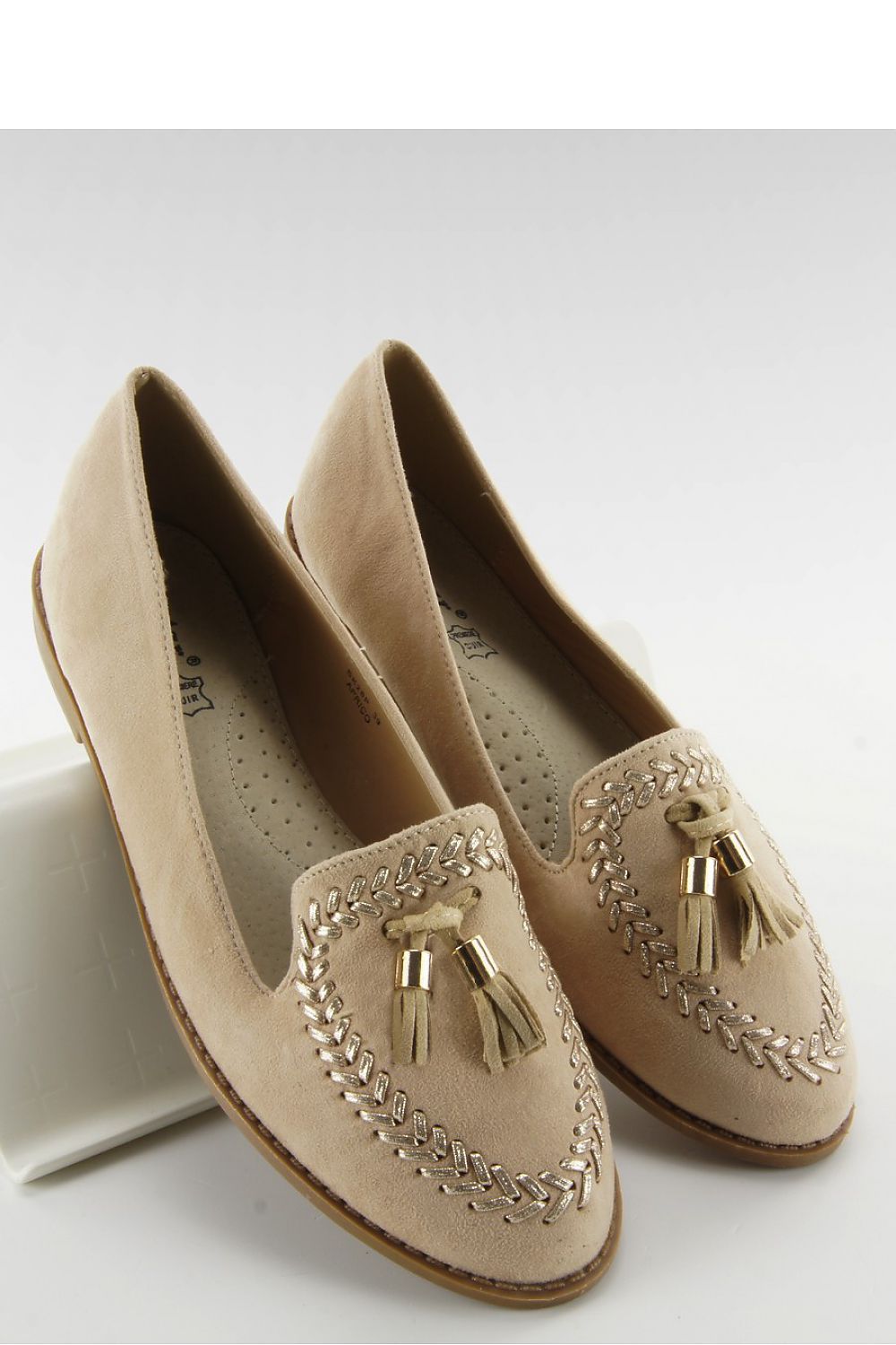 cream low heel shoes