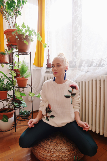 White casual knitted flared sweater with floral details