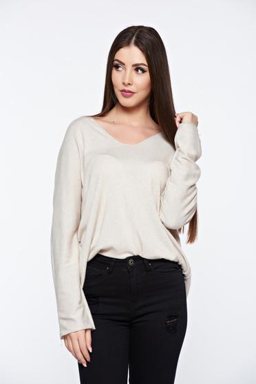 Cream women`s blouse knitted flared from soft fabric