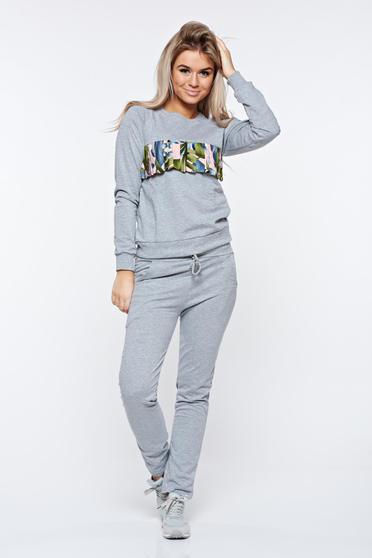 Grey set cotton with pockets is fastened around the waist with a ribbon casual