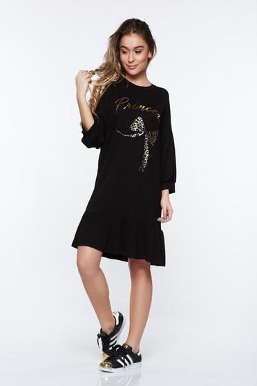 Black casual dress with easy cut from elastic fabric with ruffles at the buttom of the dress