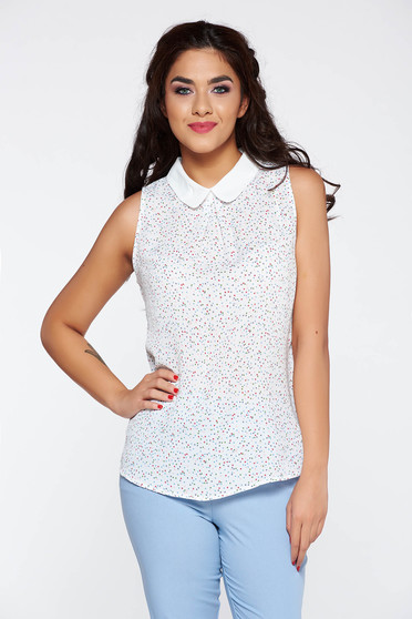 White elegant women`s blouse with a collar sleeveless airy fabric