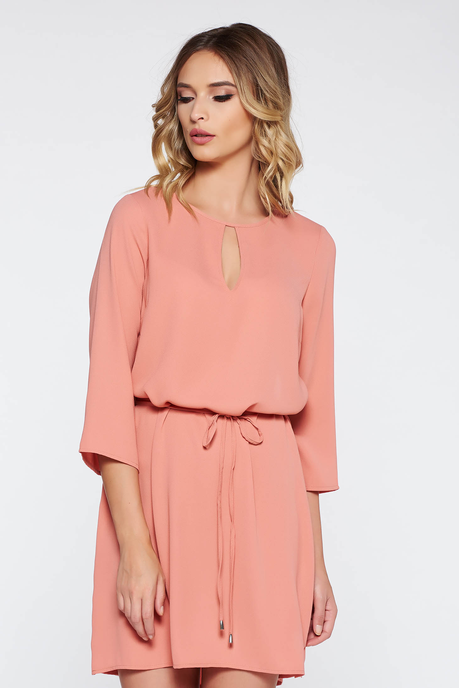Peach casual flared dress nonelastic fabric is fastened around the waist  with a ribbon