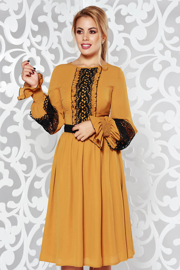 LaDonna elegant cloche mustard dress from veil fabric with lace details accessorized with tied waistband