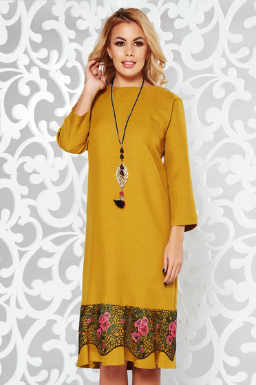 Mustard dress elegant flared slightly elastic fabric with lace details accessorized with chain