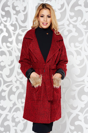 Red casual cloth coat with inside lining with pockets accessorized with tied waistband with faux fur details