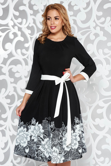 Black elegant cloche dress soft fabric accessorized with tied waistband with floral print