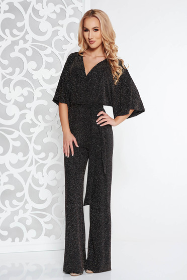 Black clubbing jumpsuit from elastic fabric with bright details accessorized with tied waistband
