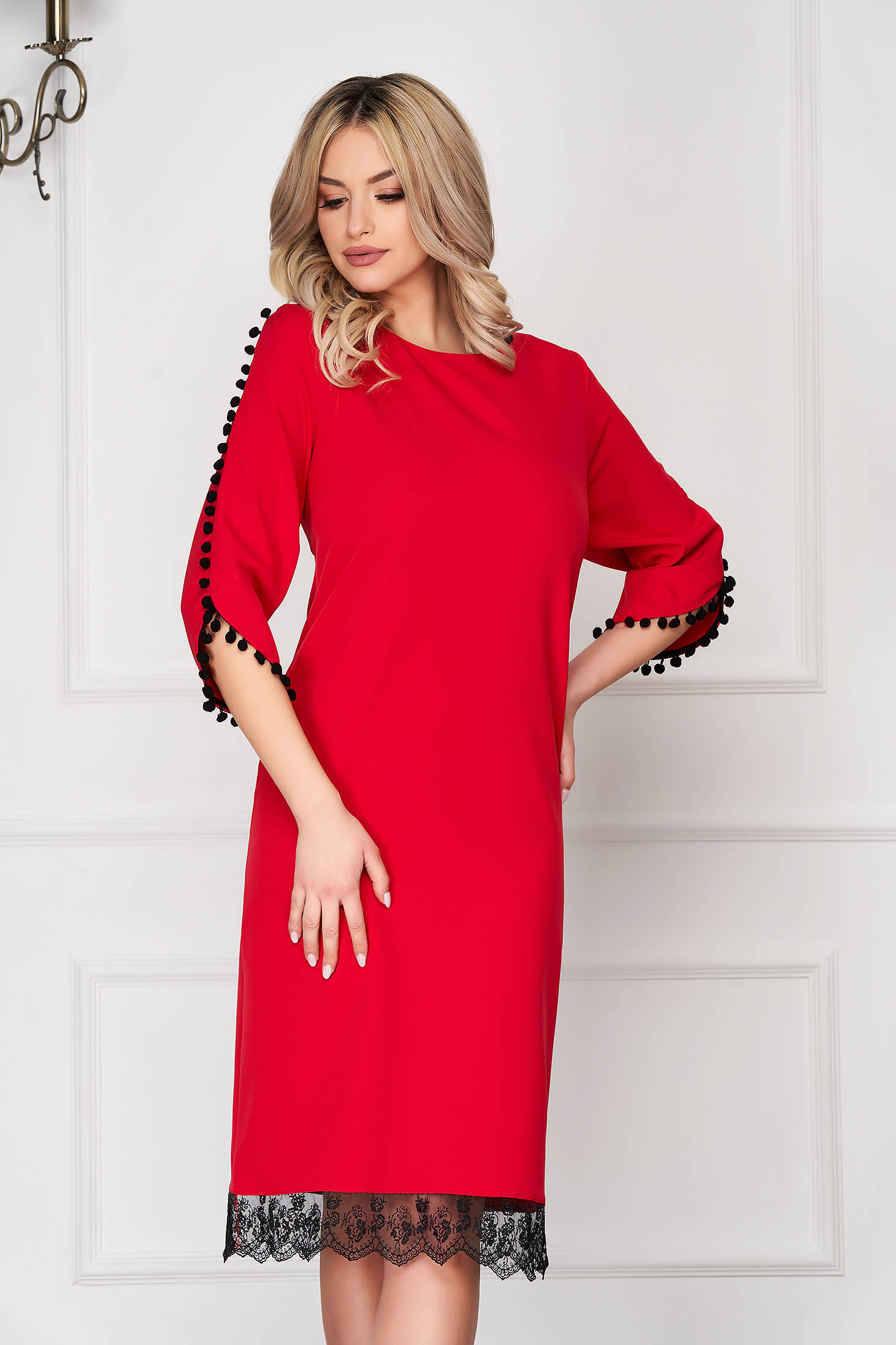 red dress with tassels