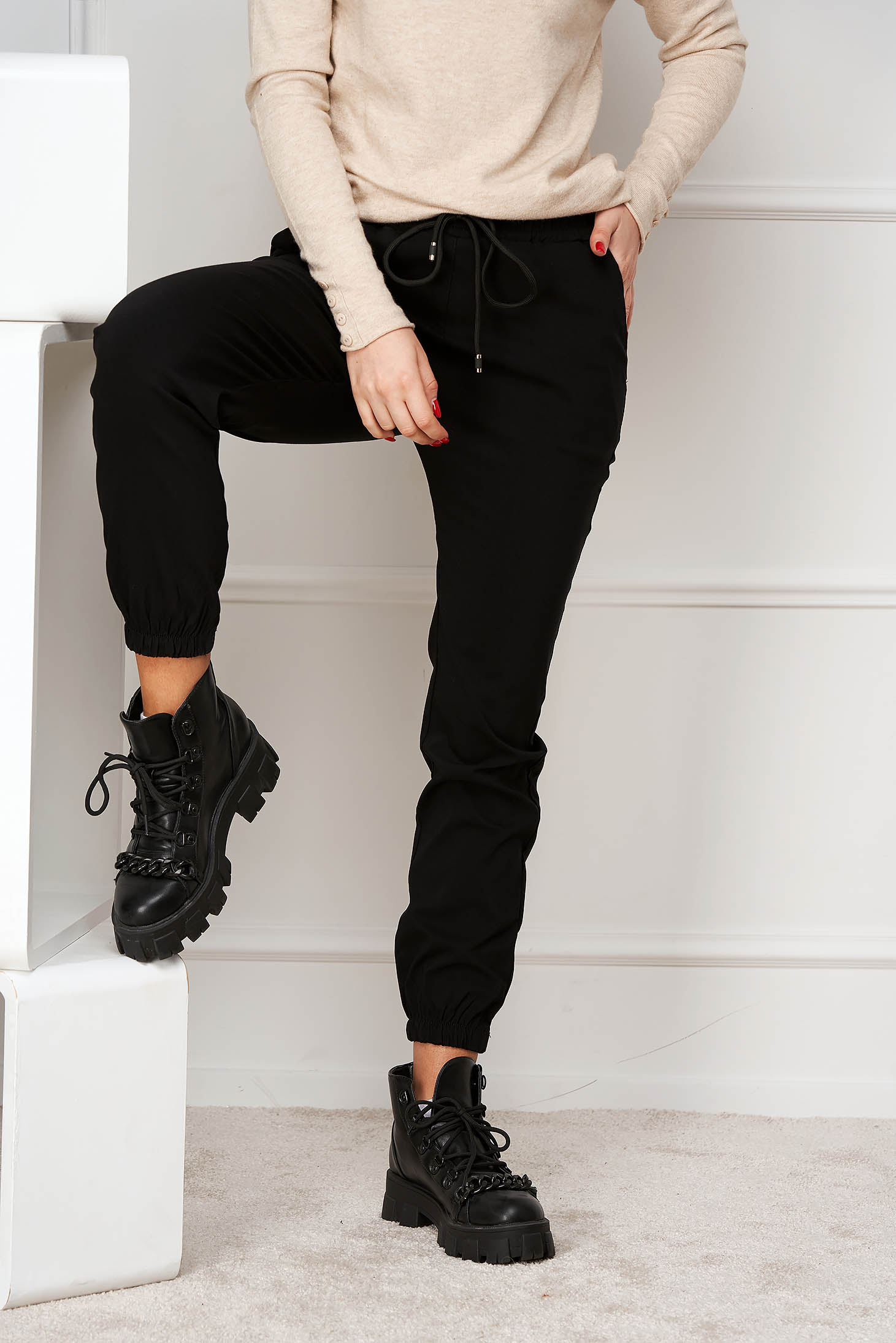 Black trousers long elastic waist is fastened around the waist with a ribbon