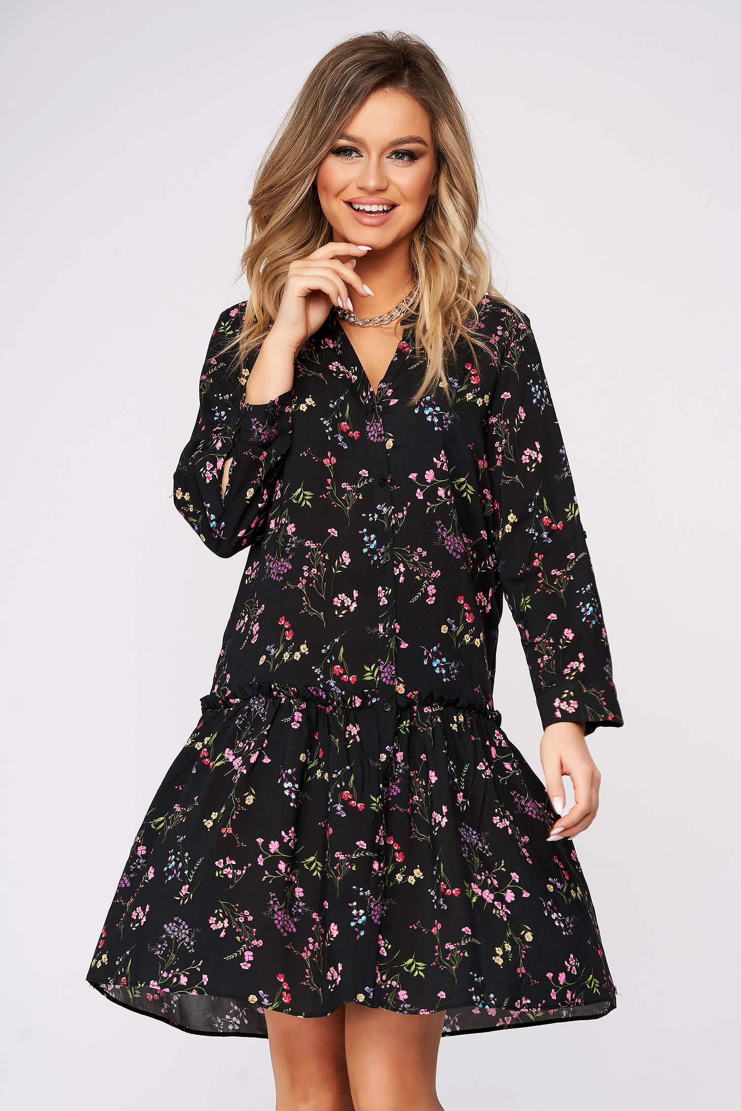 Black dress flared with v-neckline thin fabric with floral print