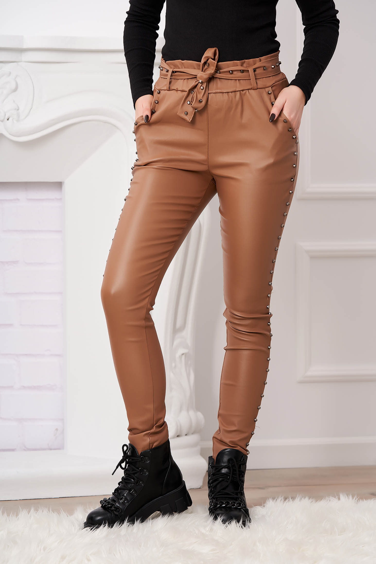 Cappuccino trousers with metallic spikes from ecological leather high waisted with tented cut