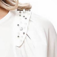 White women`s blouse from veil fabric with puffed sleeves elegant