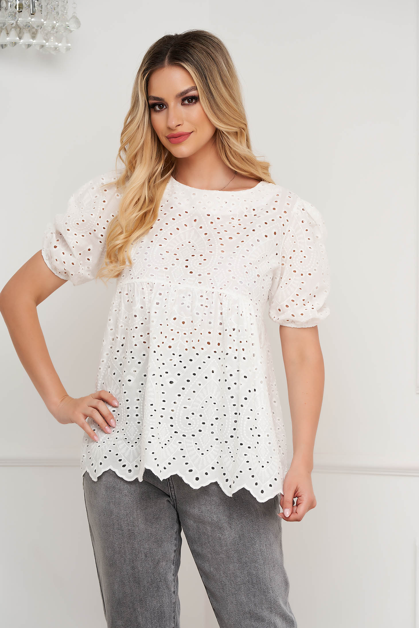 White women`s blouse guipure loose fit with rounded cleavage