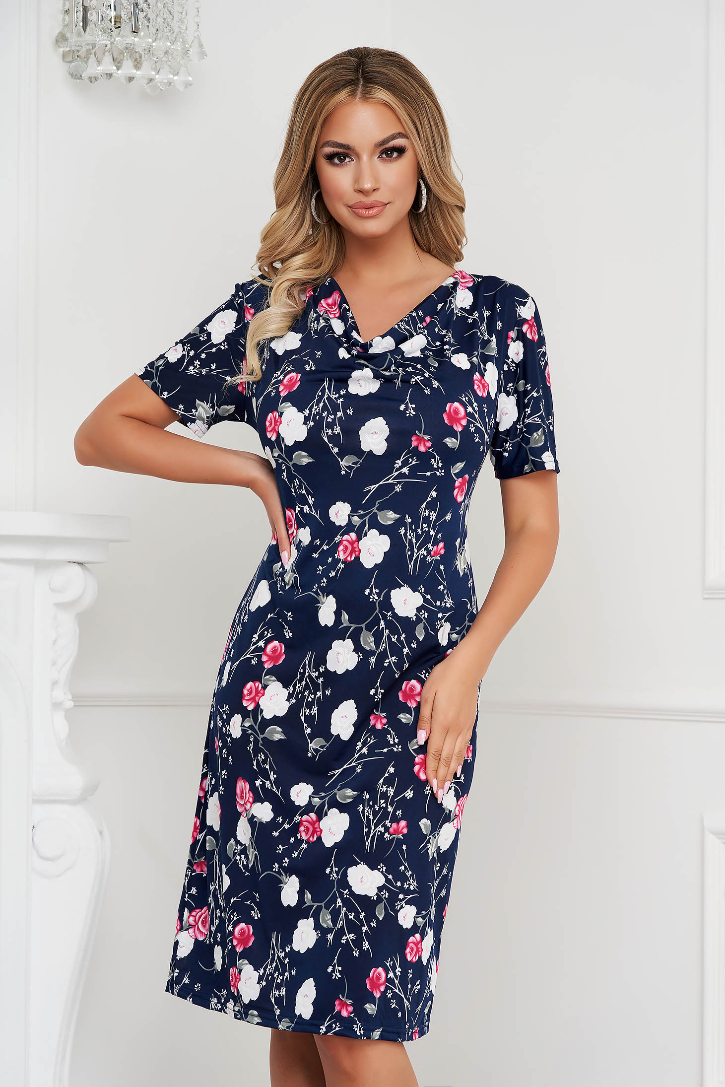 Dress with floral print from elastic and fine fabric with deep cleavage