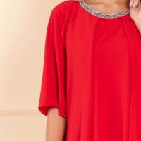 Red midi veil dress with wide cut accessorized with rhinestone gems
