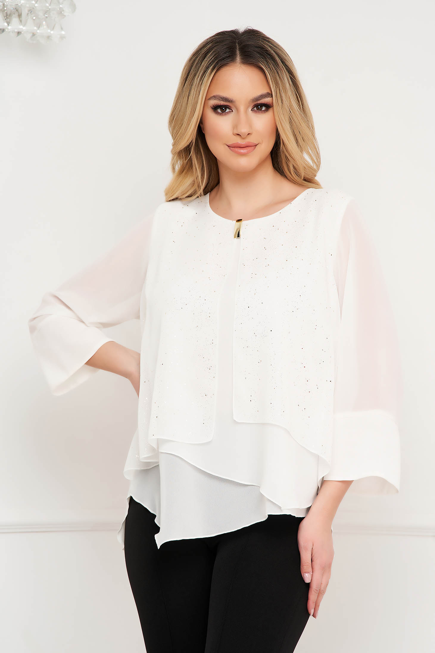 White women`s blouse loose fit thin fabric from veil fabric accessorized with breastpin asymmetrical office