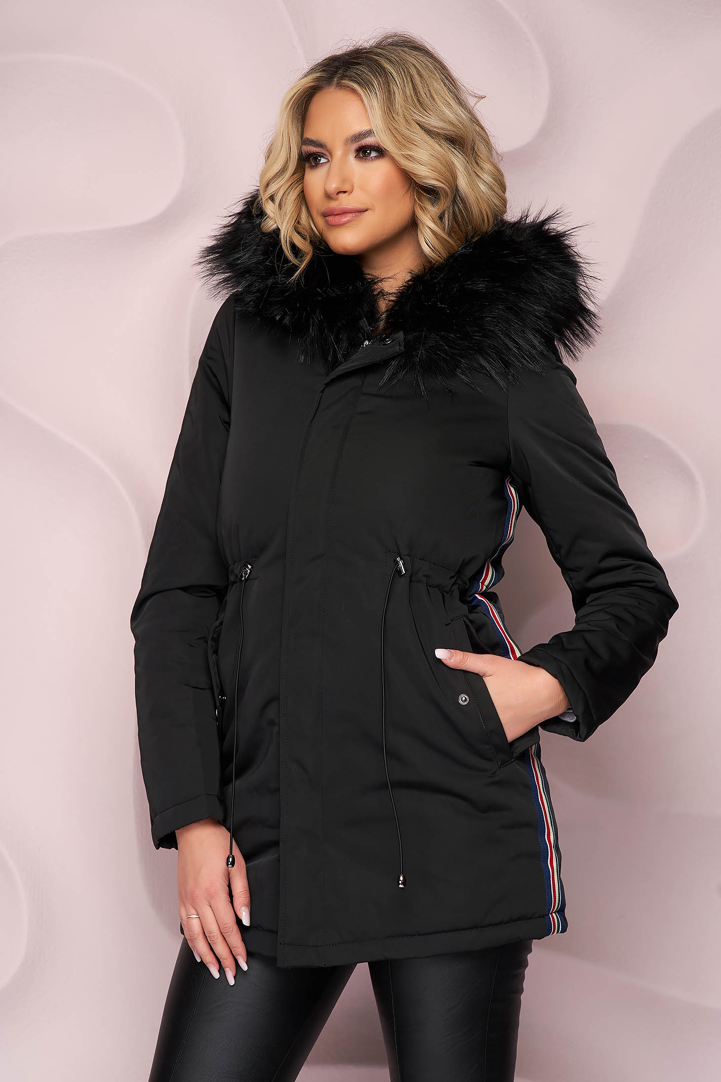 Black jacket from slicker with faux fur lining is fastened around the waist with a ribbon fur collar